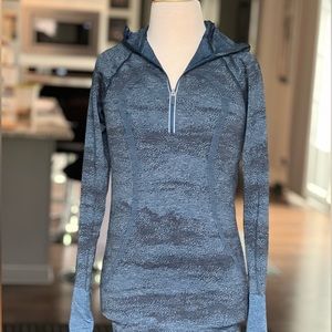 LIKE NEW Lululemon half zip top. No visible wear or piling. Size 4
